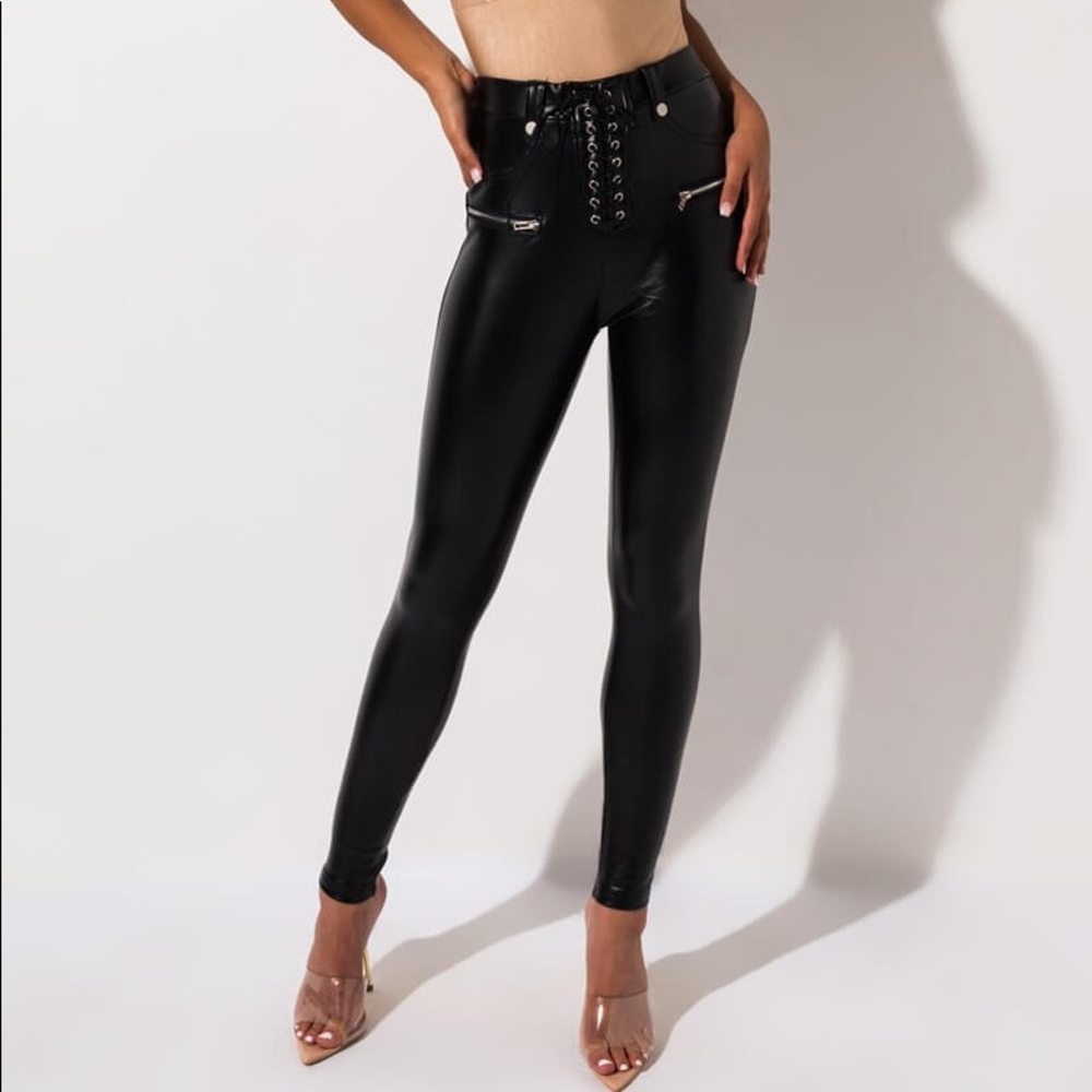 TE NECESSITO FAUX LEATHER HI RISE LACE UP LEGGINGS